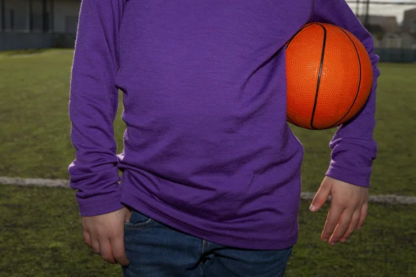 Child with a basketball — Stok fotoğraf