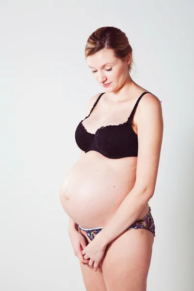 Zwangere moeder Stockfoto