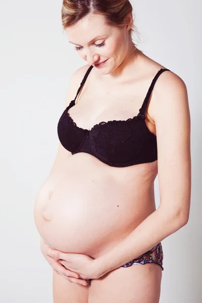 Zwangere moeder Stockafbeelding