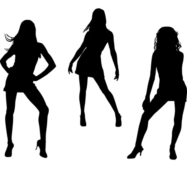 Silhouettes of dancing women — Stock Vector