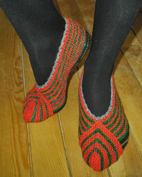 Hand knitted female slippers — Stock Photo, Image