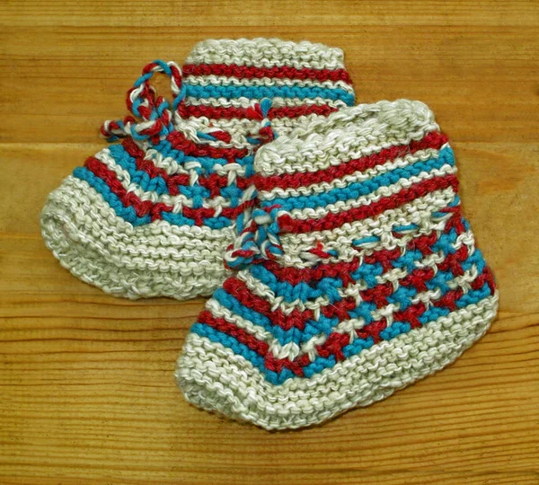 Hand knitted baby booties — Stock Photo, Image