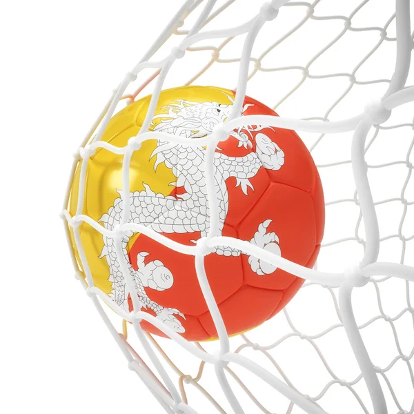 Bhutan soccer ball inside the net — Stock Photo, Image