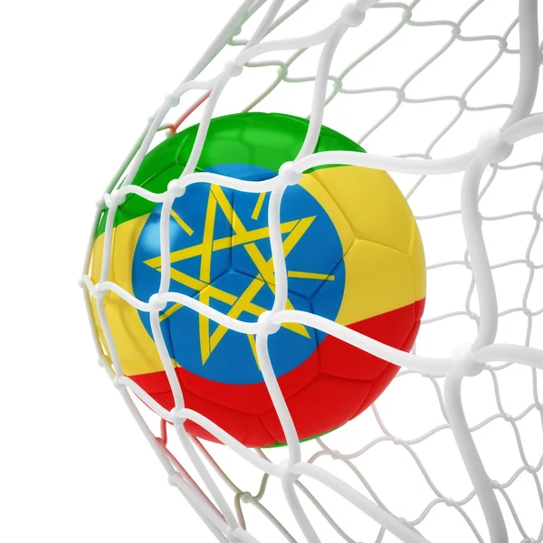 Pallone da calcio etiope dentro la rete — Foto Stock