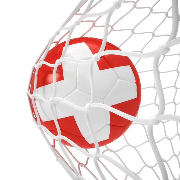 Švýcarský fotbalový míč uvnitř sítě — Stock fotografie