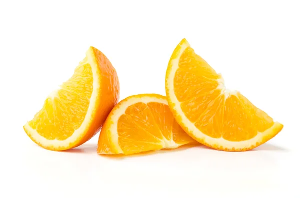 Три ломтика апельсина — стоковое фото