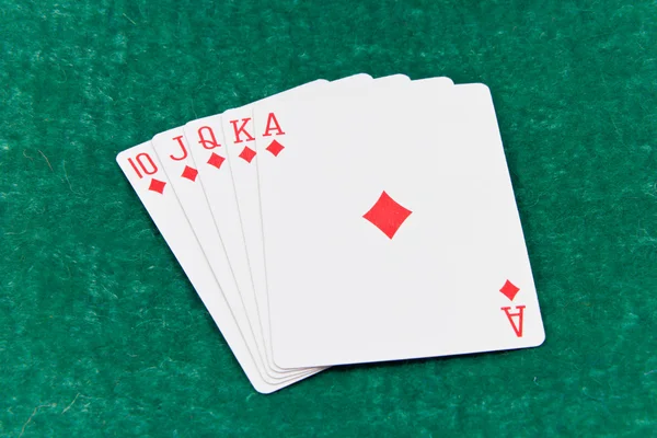 stock image Diamond royal flush on green background