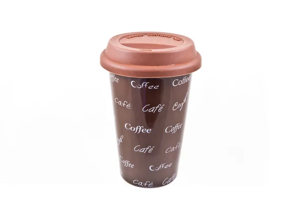 Керамическая чашка кофе с крышкой жвачки — стоковое фото