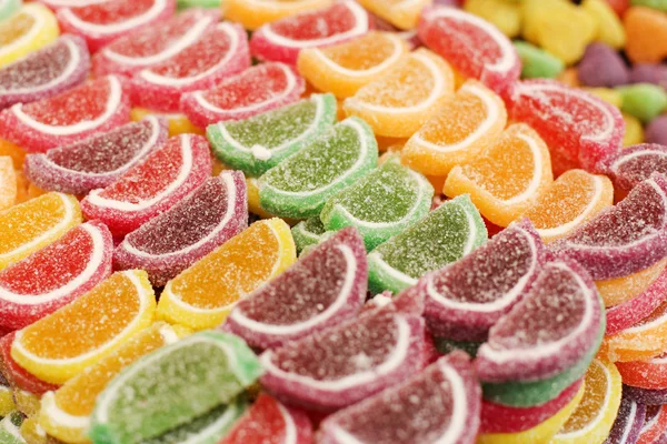 Sfondo fatto di dolci colorati e caramelle — Foto Stock