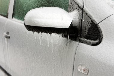 Freezing rain on a car clipart