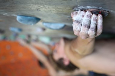 Man climbing indoor wall clipart