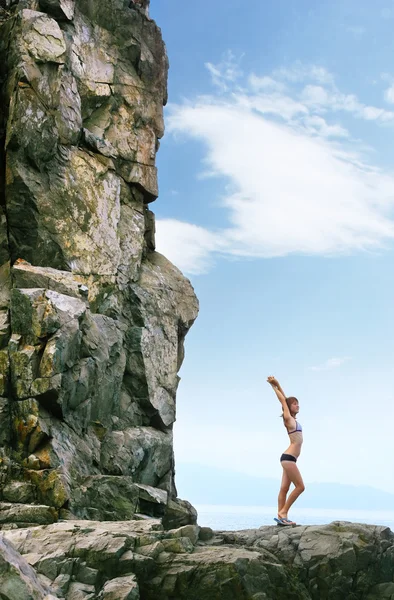 Woman and rock — Stock Photo, Image