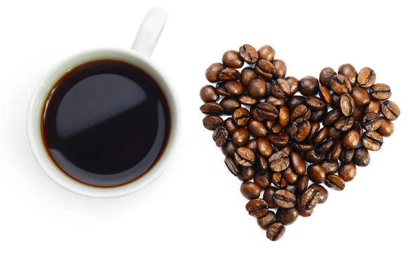 Cup of coffee with heart shaped sign from coffee beans — Stock Photo, Image