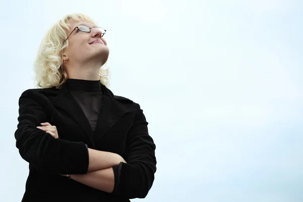 Woman over sky background — Stock Photo, Image