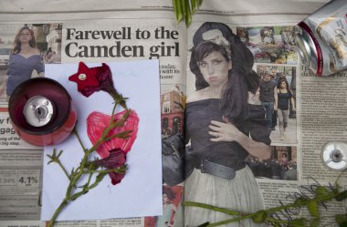 LONDON - JULY 27: Her fans pay tribute to Amy Winehouse clipart