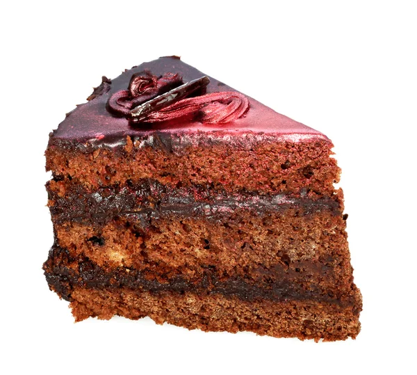 One piece of cake covered with chocolate icing with mother of pe — Stock Photo, Image