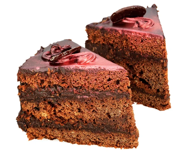 Un pedazo de pastel cubierto con hielo de chocolate con la madre de pera — Foto de Stock