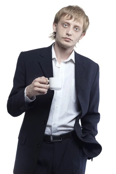 Mladý podnikatel s hrnek na kávu — Stock fotografie
