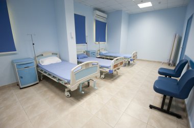 Beds in a hospital ward clipart