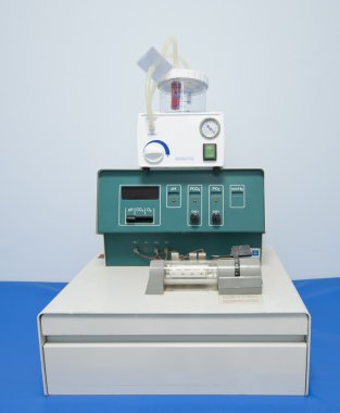 Blood gas check machine in hospital clipart