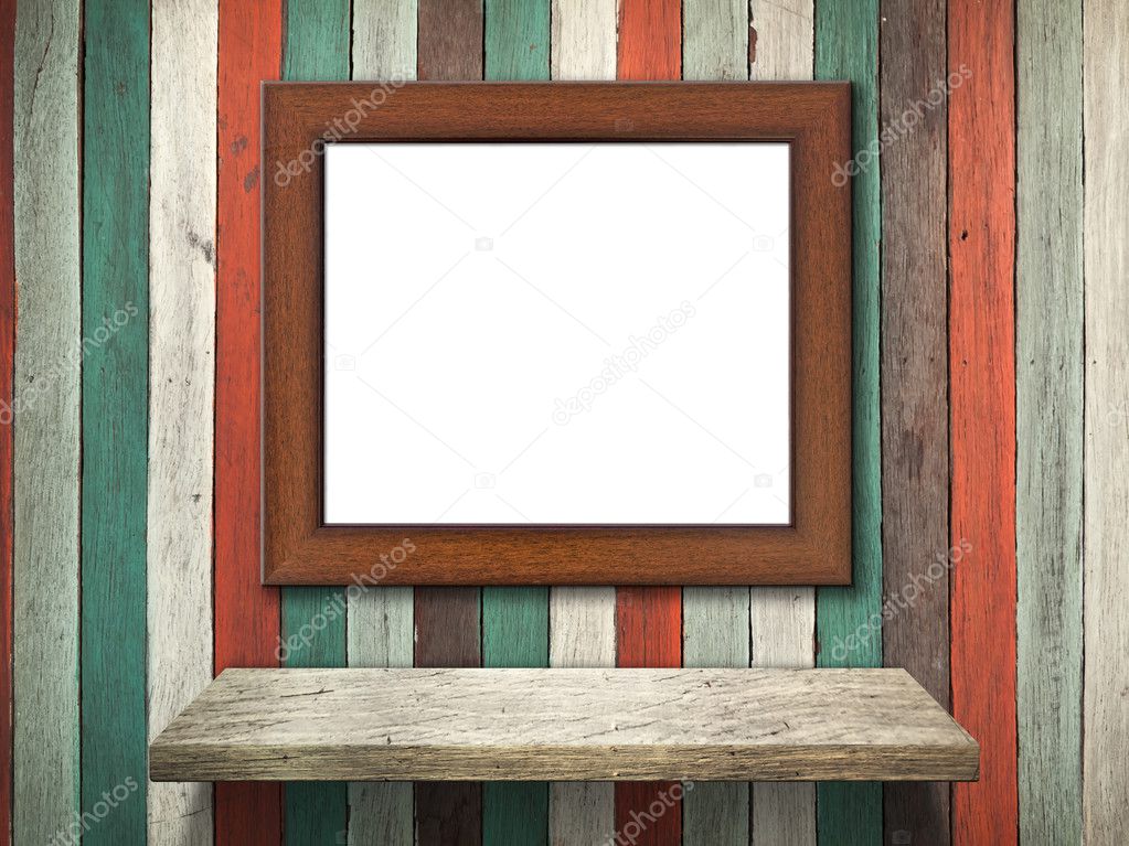 Picture frame on Old wood wall and shelf