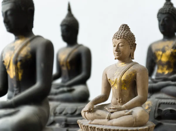 Light Stone Buddha focus and Three Dark out — Stock Photo, Image