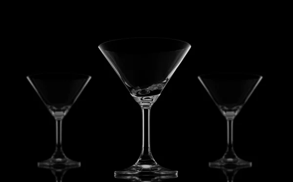 Три коктейльні окуляри на чорному — стокове фото