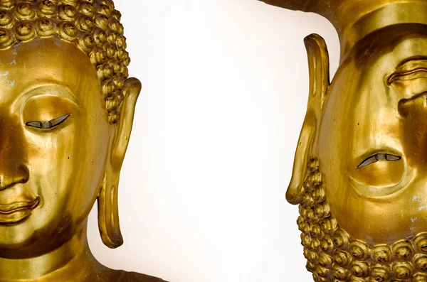 Duas meias caras de imagem buda de ouro — Fotografia de Stock