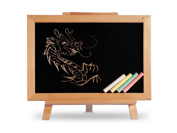 Дракон малює дерев'яну рамку з дошки — стокове фото
