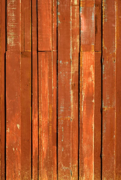 Konsistens av orange färg måla plank vertikala — Stockfoto