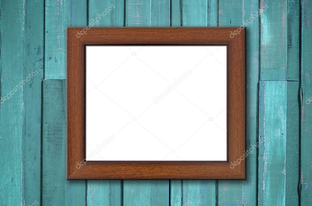 Brown wood picture frame on Green wall