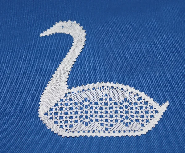 Spets material swan. — Stockfoto