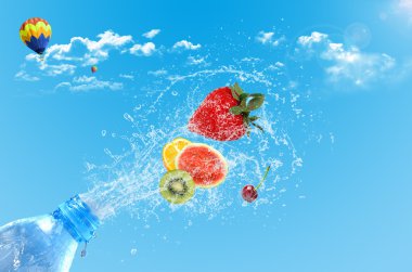 Bottle with splashes and fruits clipart