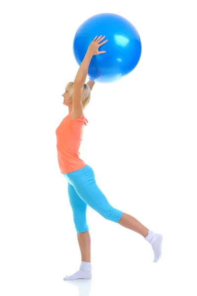 Young woman with blue ball — Stock Photo, Image