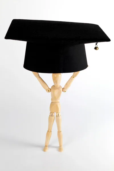 Mortarboard - lifting Stock Photo