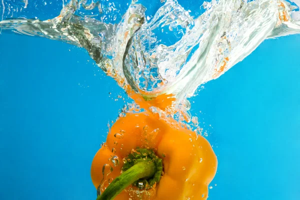 stock image YELLOW PEPPER SPLASHING IN WATER