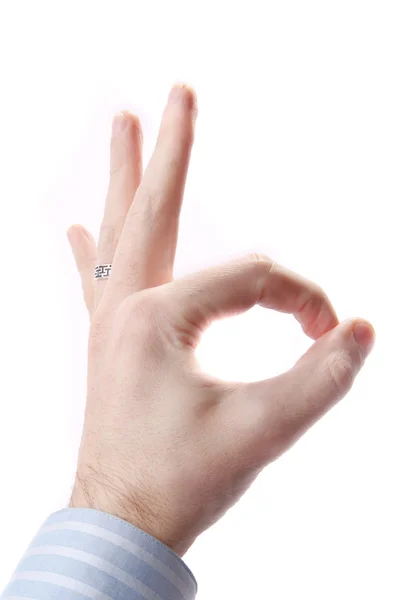 Чоловіча рука жестикулює знак добре ізольовано на білому тлі — стокове фото