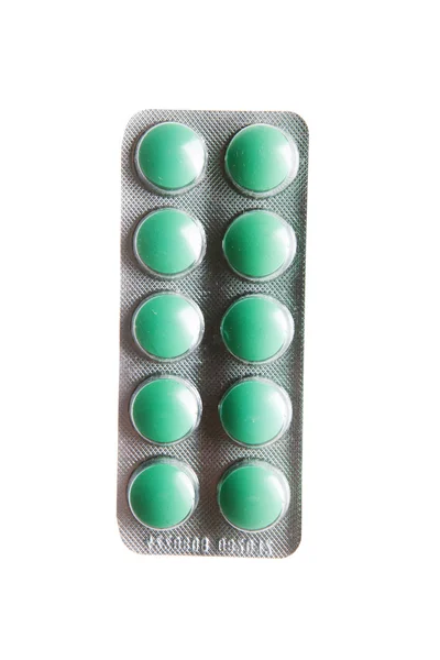 Medicina pílulas em caixa isolada sobre fundo branco — Fotografia de Stock