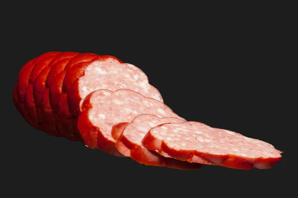 Verse salami geïsoleerd op grijze achtergrond — Stockfoto