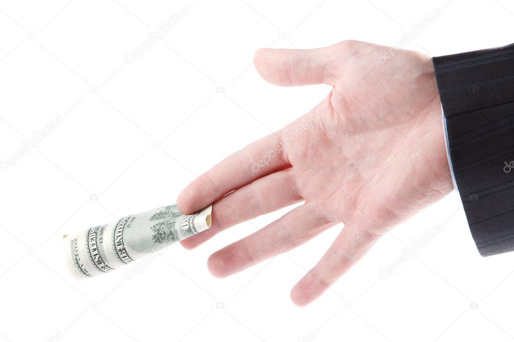 Man's hand holding dollar bills