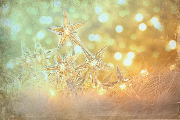 Estrela luzes de férias com fundo brilhante — Fotografia de Stock