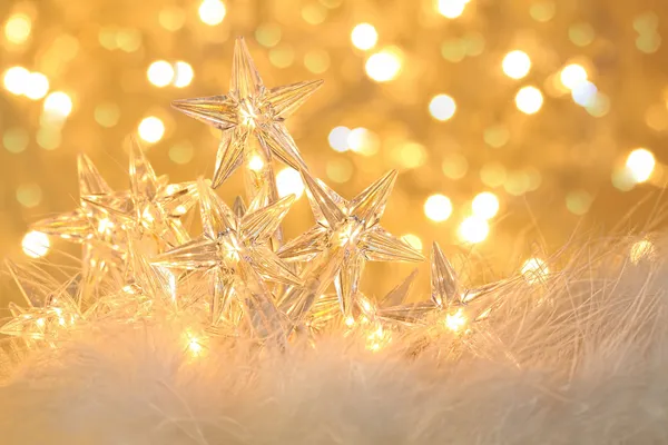 Star holiday lights with sparkle background Stock Image
