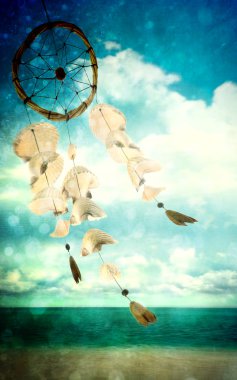 Sea shells wind chime blowing in the wind clipart