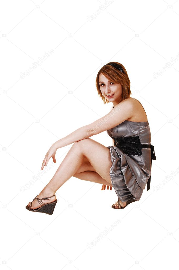 Girl crouching on floor. — Stock Photo © sucher #10326135