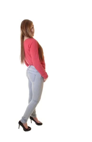 Dívka v džíny a svetr. — Stock fotografie