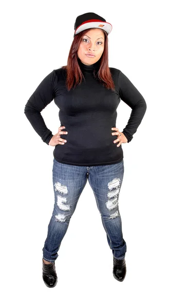 Flickan står i jeans. — Stockfoto