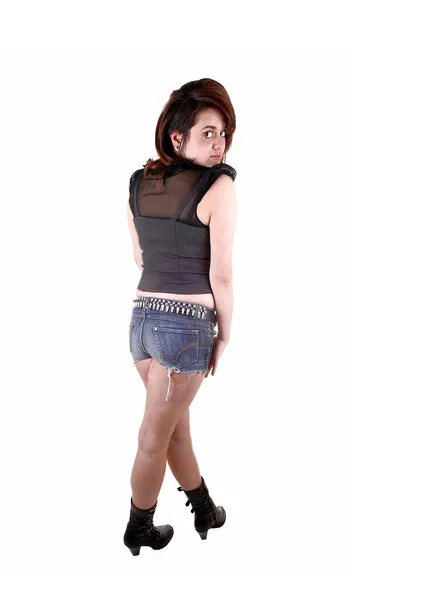 Meisje in korte broek. — Stockfoto