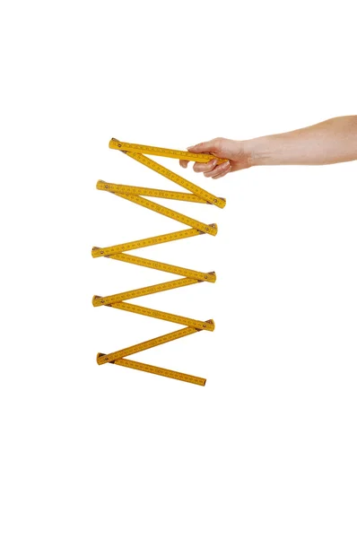 Arm with wood ruler. — Stock Photo, Image