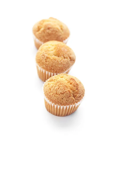 Drie muffins geïsoleerd op wit — Stockfoto