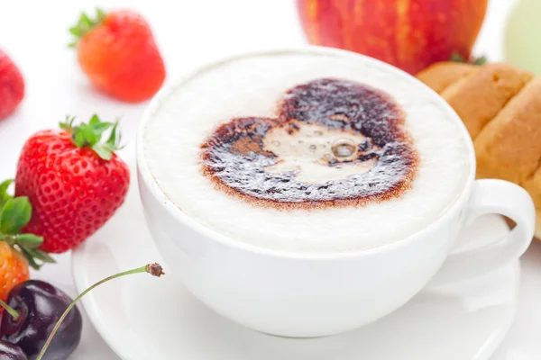 Cappuccino in a cup in the shape of hearts,cherry,croissant and — Stock Photo, Image